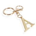 Initial | Llavero de bolso elegante en dorado