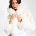 RIEL | Chaqueta de lana atemporal con capucha y cuello de piel